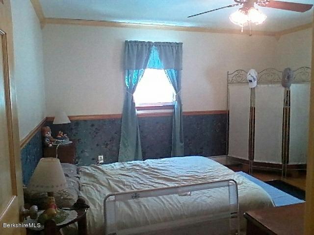 74 East Main Road Peru, MA 01235 - Photo 13 of 22 a bedroom with a bed and a window