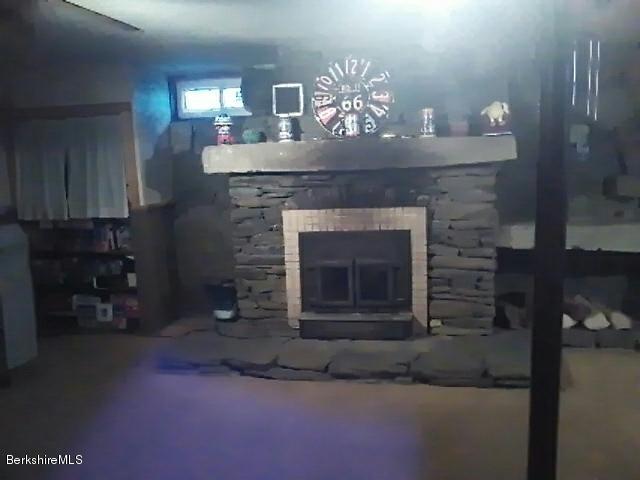 74 East Main Road Peru, MA 01235 - Photo 17 of 22 a living room with a fireplace