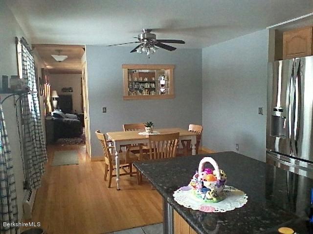 74 East Main Road Peru, MA 01235 - Photo 4 of 22 a living room with furniture and a table