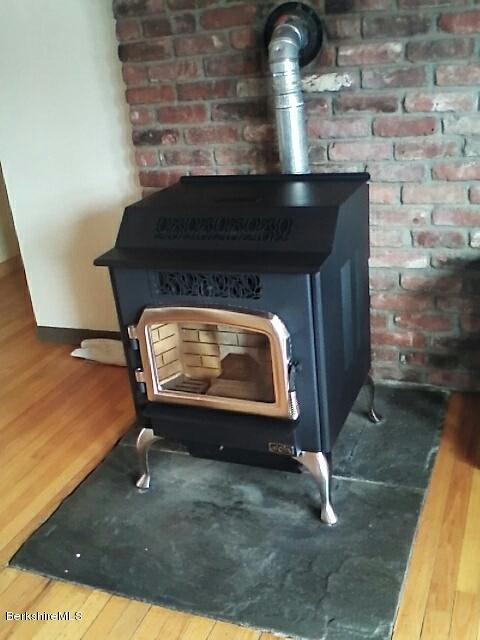 74 East Main Road Peru, MA 01235 - Photo 7 of 22 a closeup of a fireplace