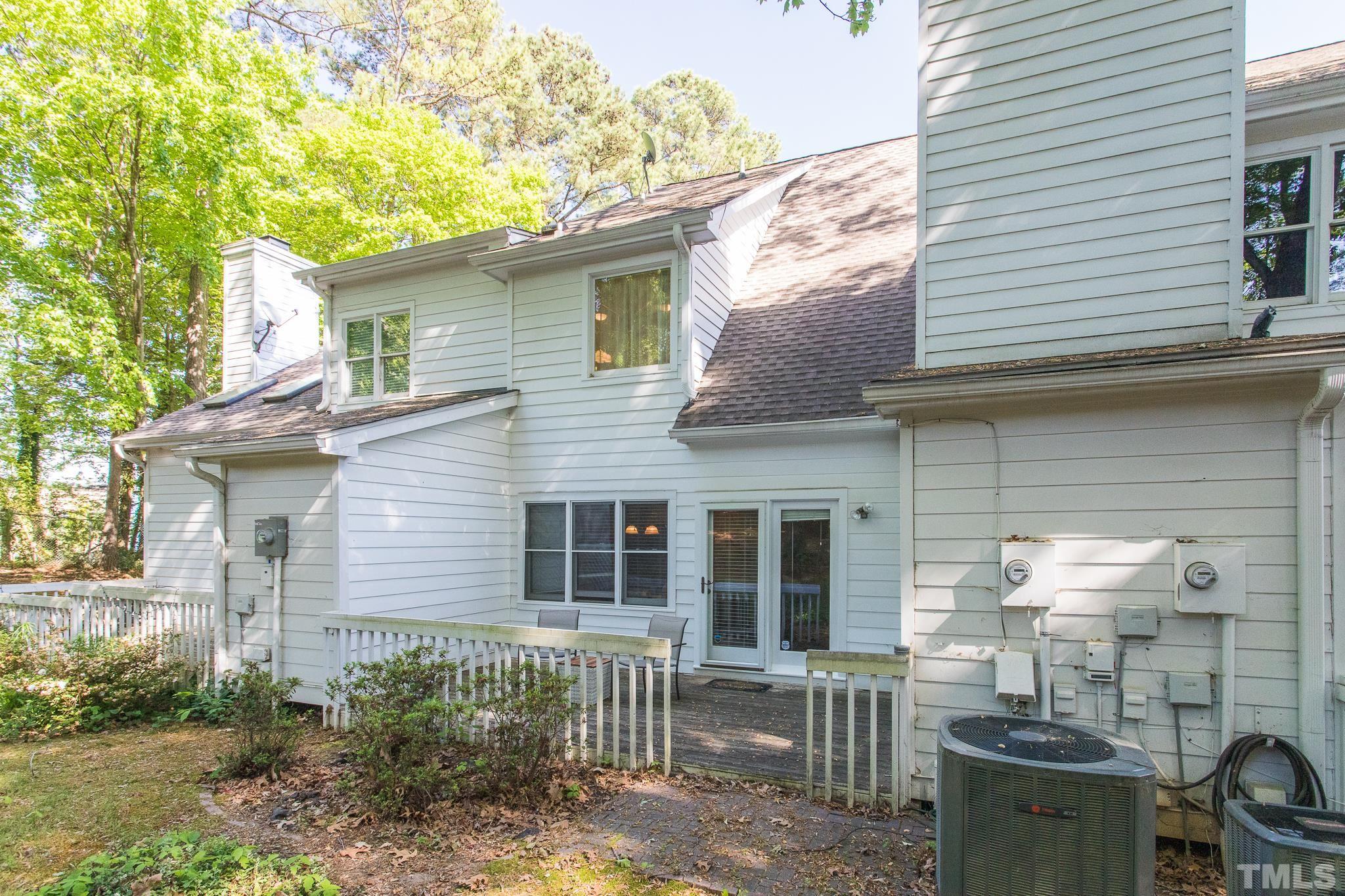 3722 Carnegie Lane Raleigh, NC 27612 - Photo 26 of 30 a view of a house with a yard and sitting area