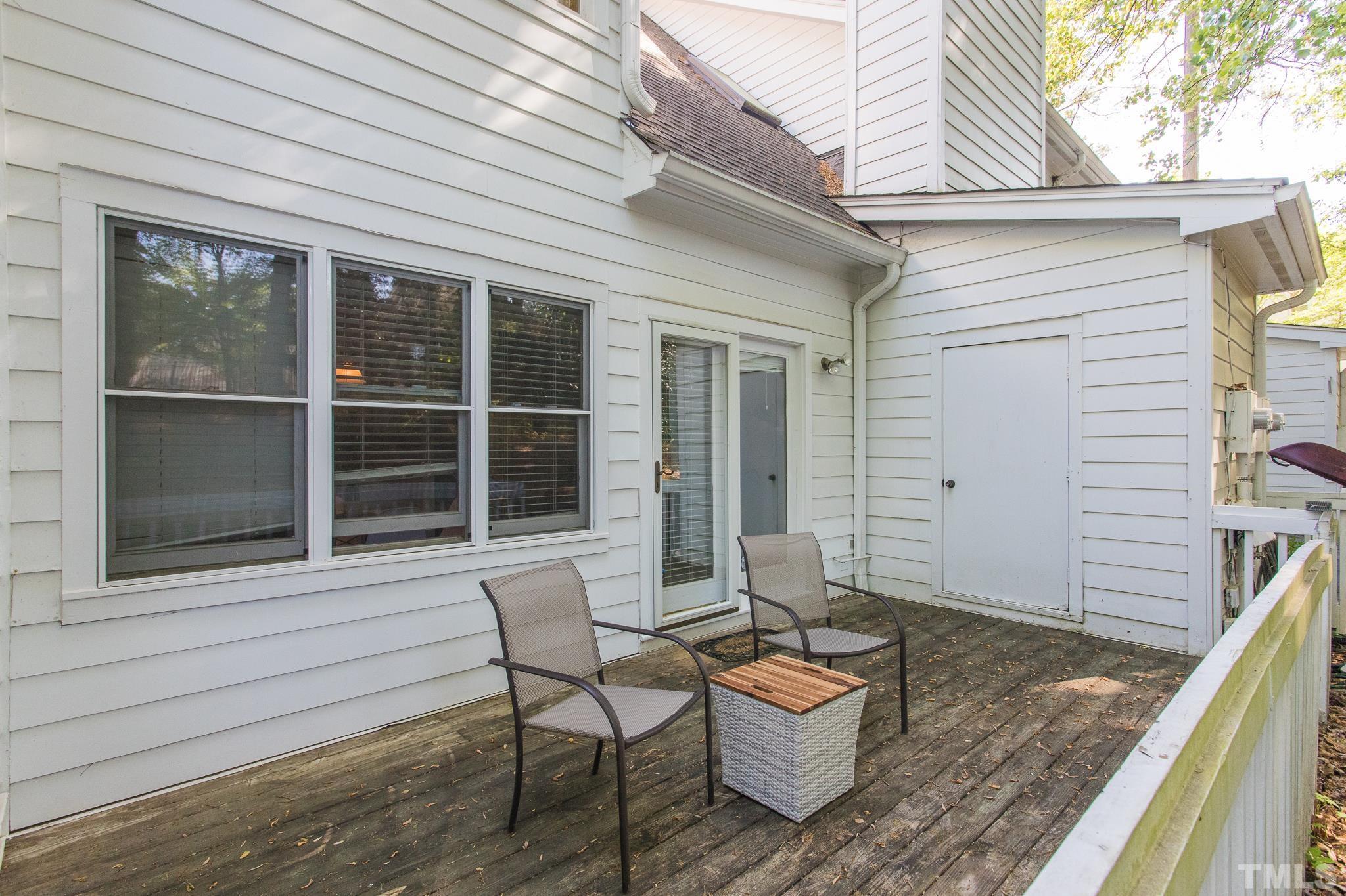 3722 Carnegie Lane Raleigh, NC 27612 - Photo 27 of 30 a view of a house with backyard and sitting area