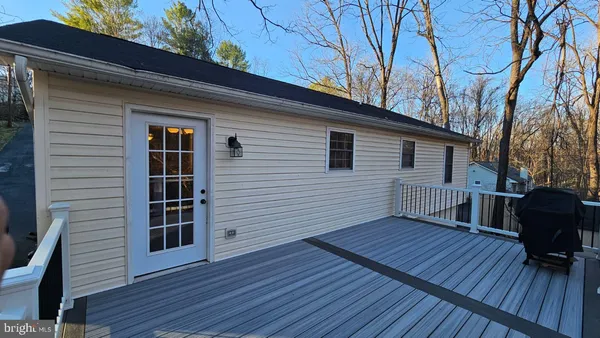 a view of a house with a deck
