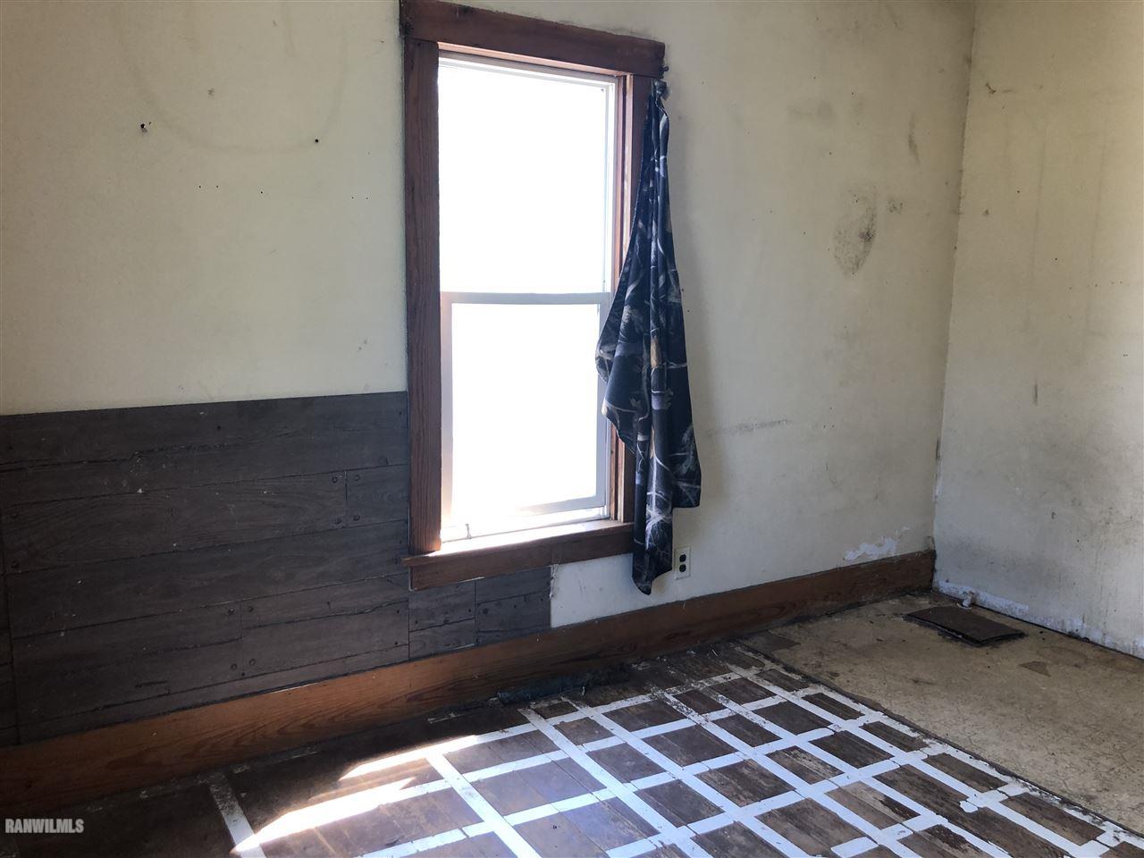 5998 Daggert Road Mount Carroll, IL 61053 - Photo 11 of 12 a view of a house with a window
