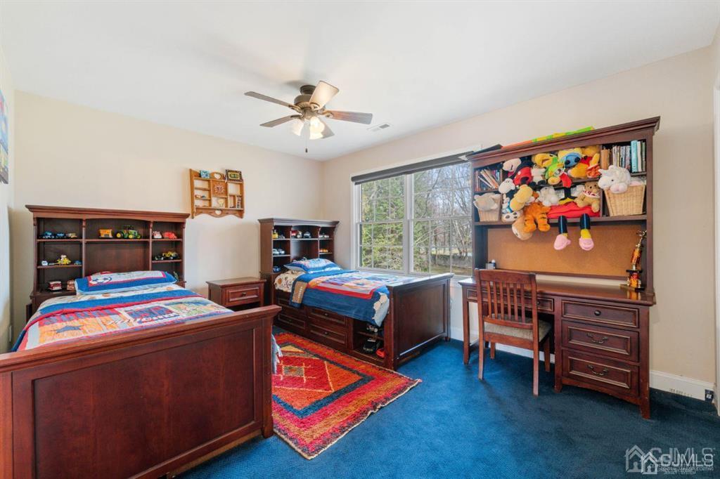 22 Utica Road Edison, NJ 08820 - Photo 23 of 28 a bedroom with a bed and a window