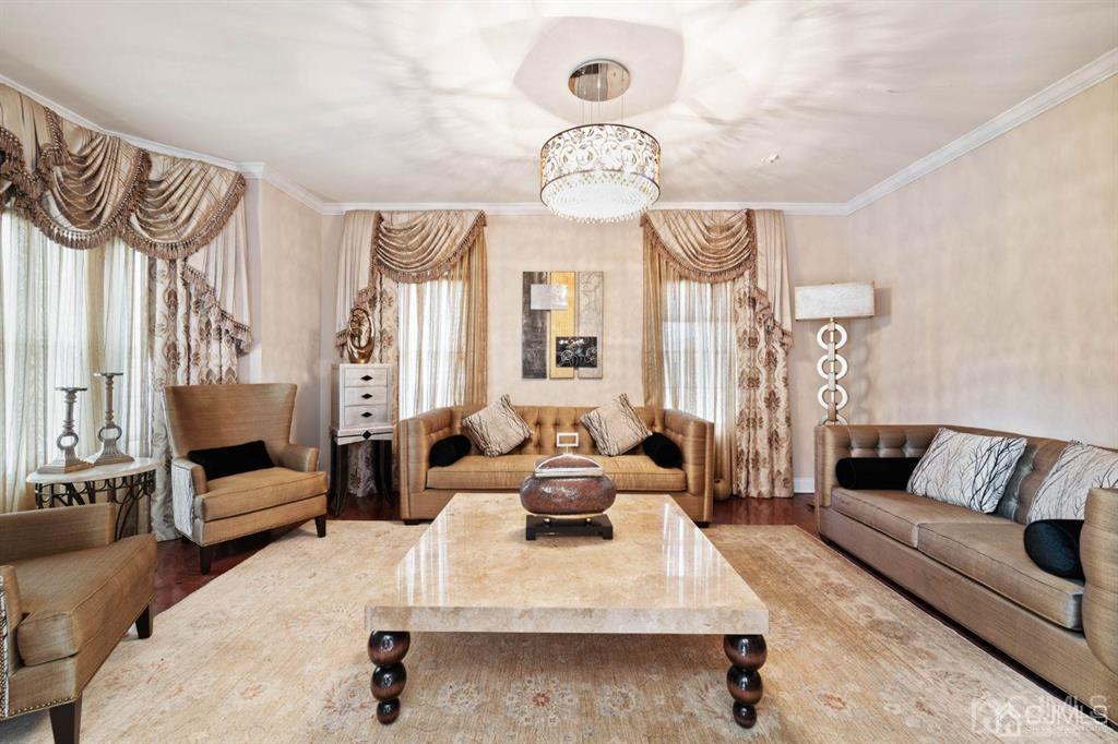 22 Utica Road Edison, NJ 08820 - Photo 5 of 28 a living room with furniture and a large window