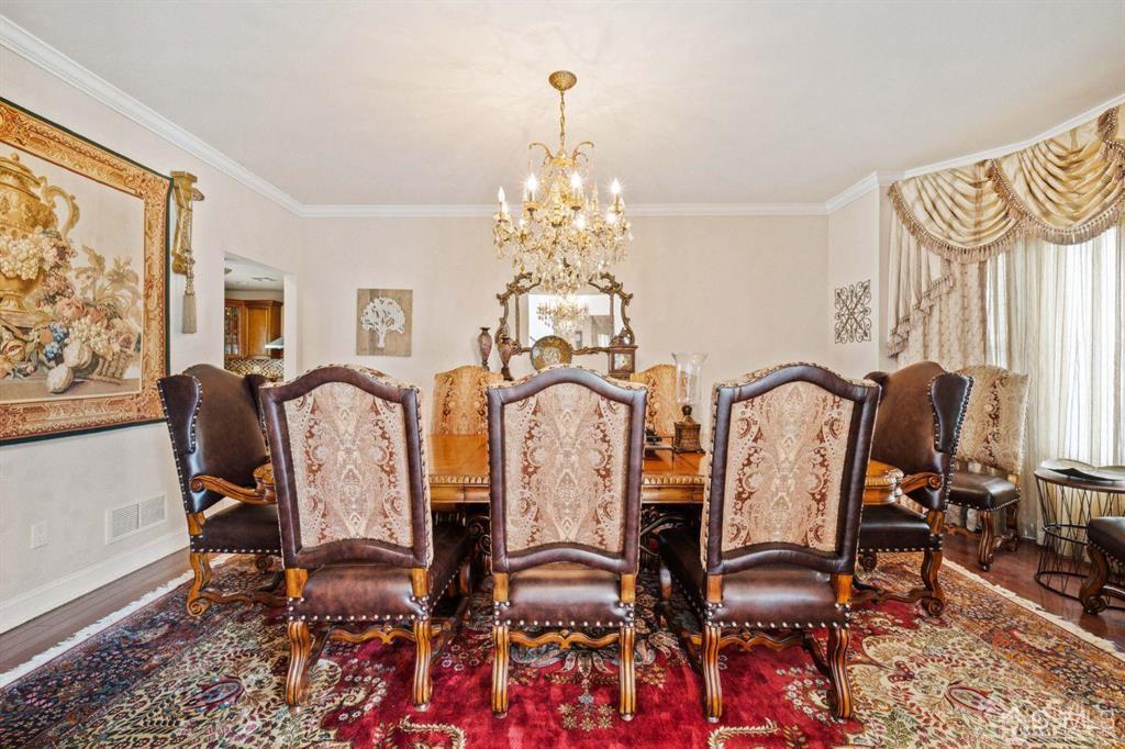 22 Utica Road Edison, NJ 08820 - Photo 8 of 28 a view of a dining room with furniture window and wooden floor