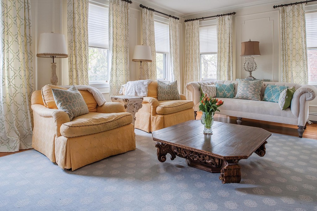 82 Atherton Road, Unit 1 Brookline, MA 02446 - Photo 2 of 9 a living room with furniture and a large window