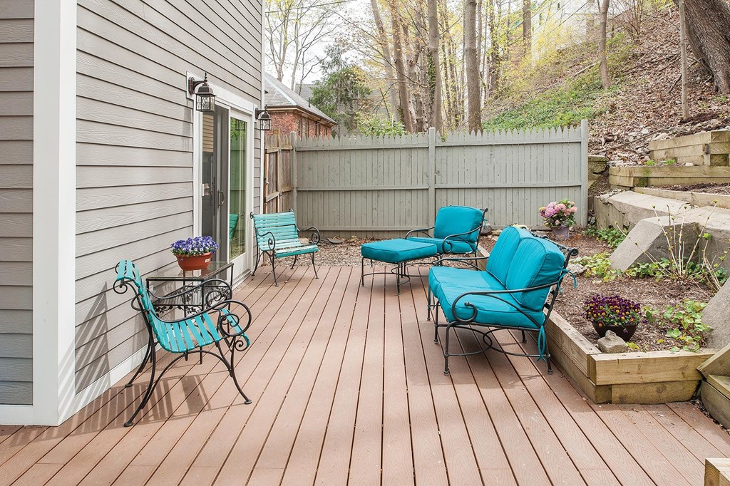 82 Atherton Road, Unit 1 Brookline, MA 02446 - Photo 9 of 9 a view of outdoor sitting area with furniture and wooden floor