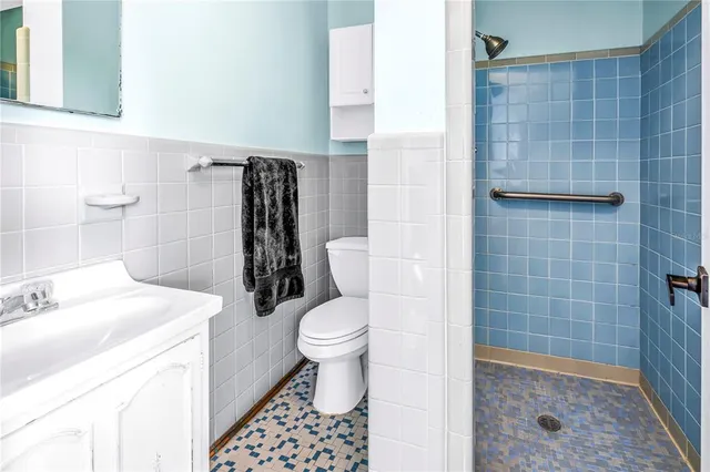 a view of an empty room with a sliding door