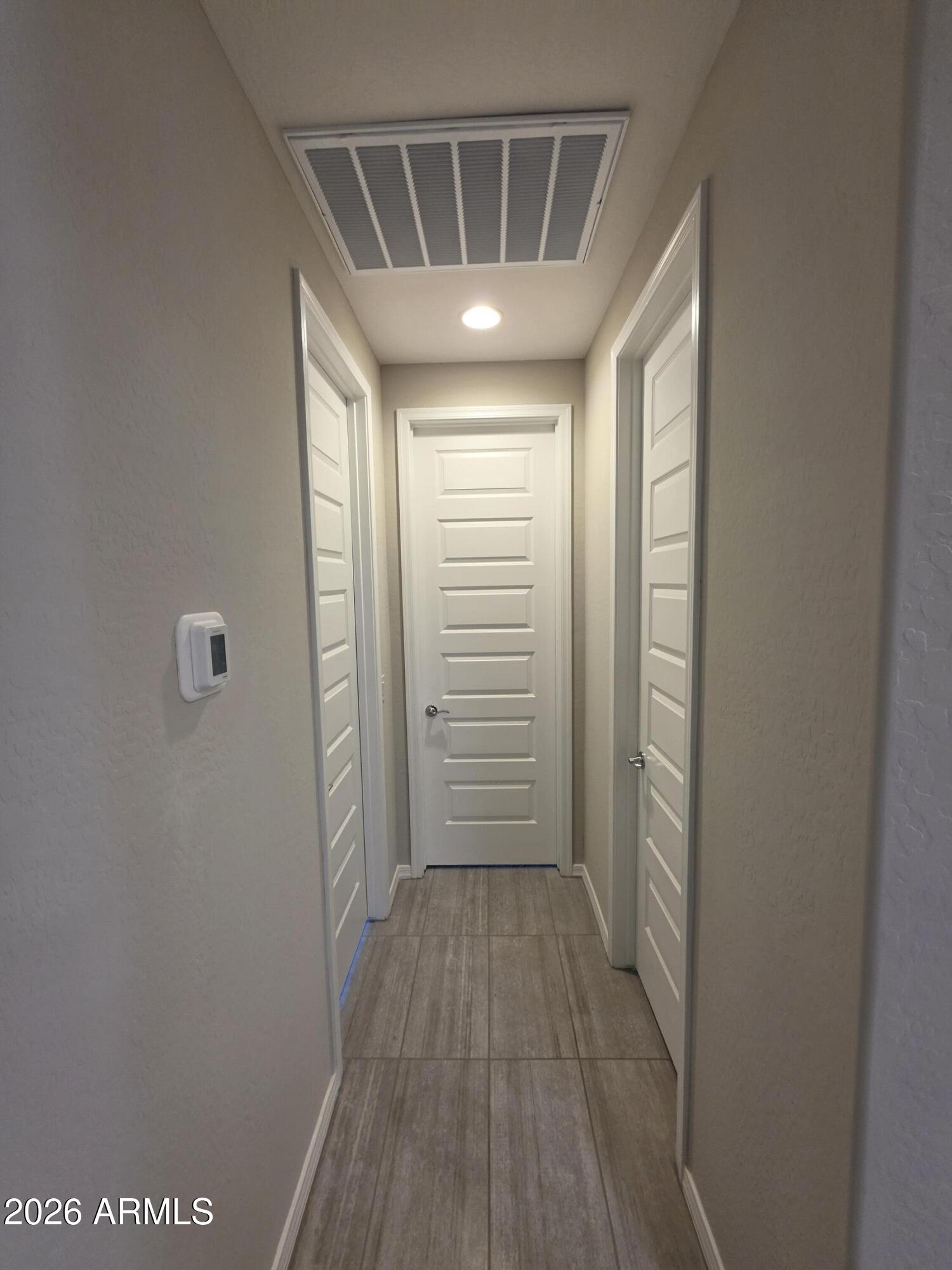 7128 West Coles Road Laveen, AZ 85339 - Photo 26 of 38 a view of hallway with wooden floor