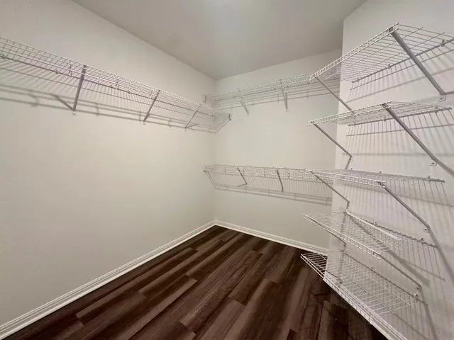 a view of a room with racks on the wall