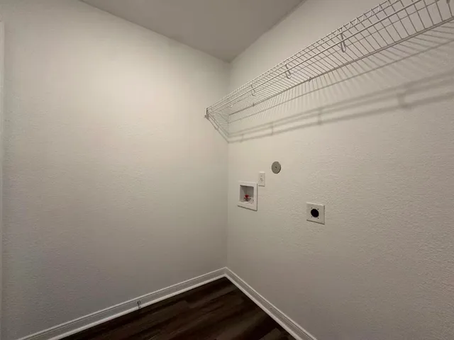 a view of small space with racks on the wall