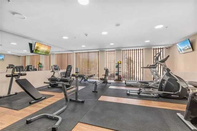 a room with lots of gym equipment