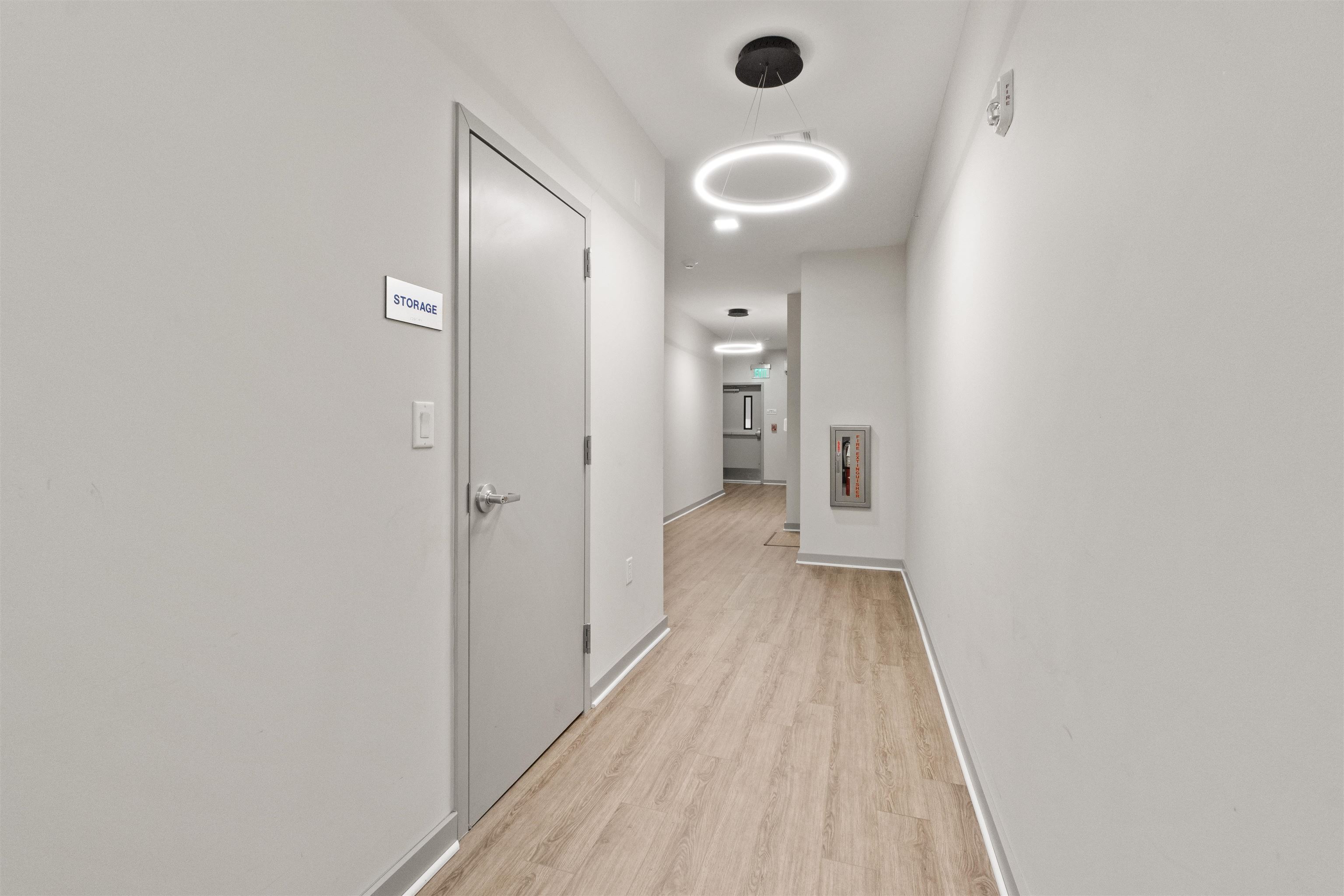 662 Avenue C, Unit 304 Bayonne, NJ 07002 - Photo 5 of 20 a view of a bathroom with a sink and a mirror