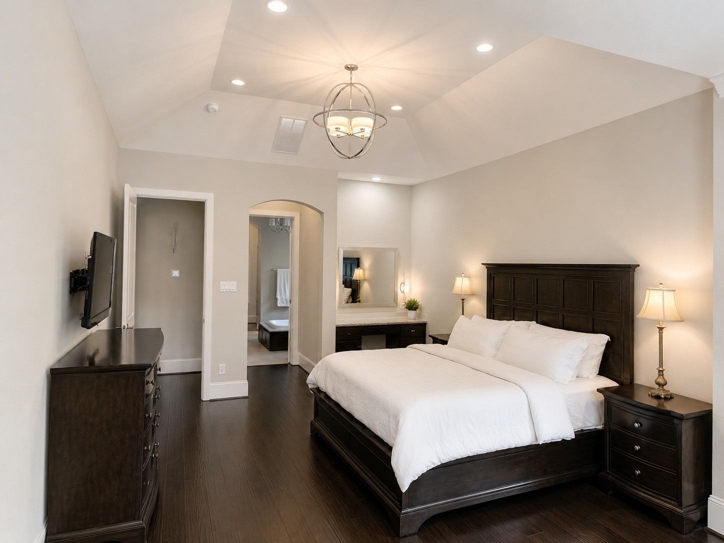 2926 Fairmont Ridge Lane Katy, TX 77494 - Photo 25 of 49 a bedroom with a bed and a chandelier