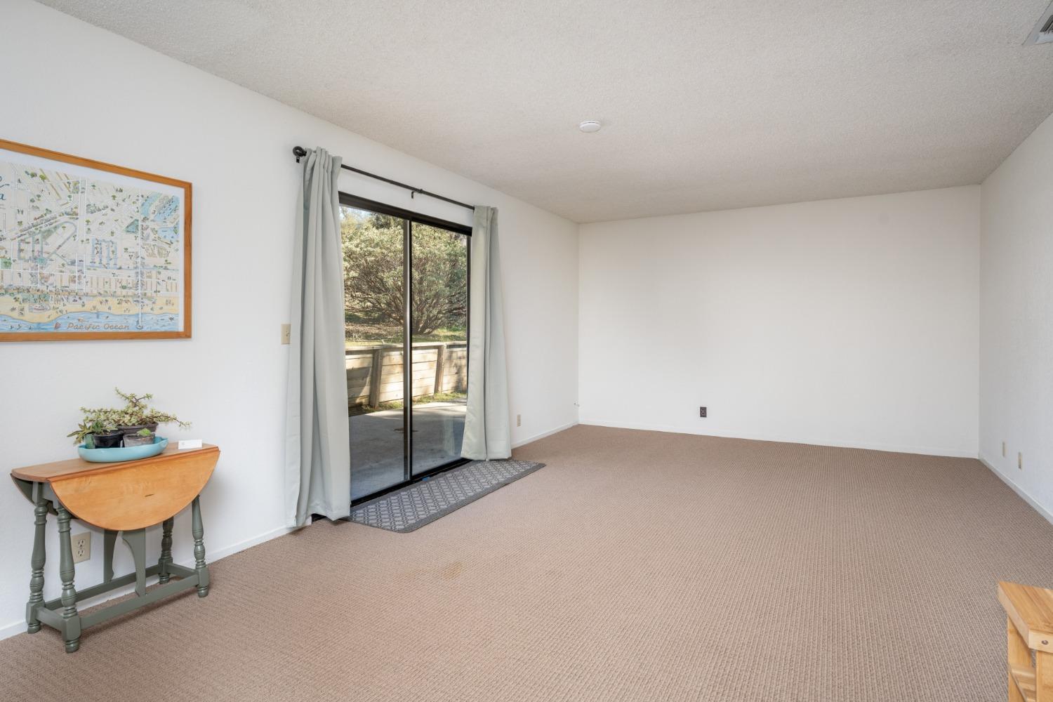 46011 Ming Circle Oakhurst, CA 93644 - Photo 16 of 37 a view of an empty room with a window