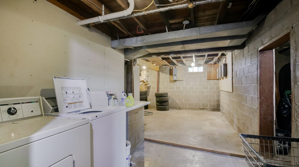 3121 Seymour Road, Unit 3 Eau Claire, WI 54703 - Photo 43 of 46 COMMON BASEMENT WITH COIN OPERATED LAUNDRY