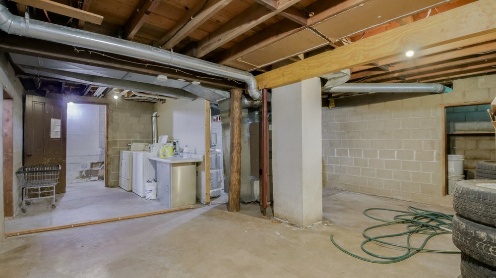 3121 Seymour Road, Unit 3 Eau Claire, WI 54703 - Photo 44 of 46 COMMON BASEMENT WITH COIN OPERATED LAUNDRY