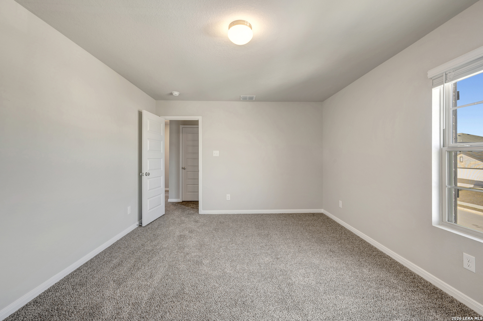 10330 Goodison Drive Converse, TX 78109 - Photo 31 of 42 an empty room with windows
