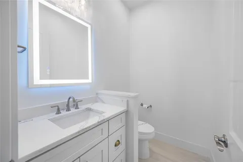 a kitchen with sink and cabinets