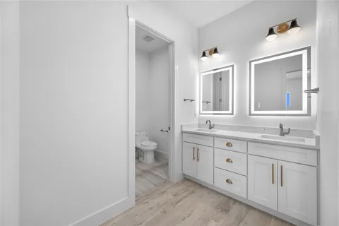 a view of a livingroom with a ceiling fan and window