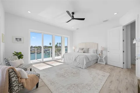 a view of an empty room with a potted plant