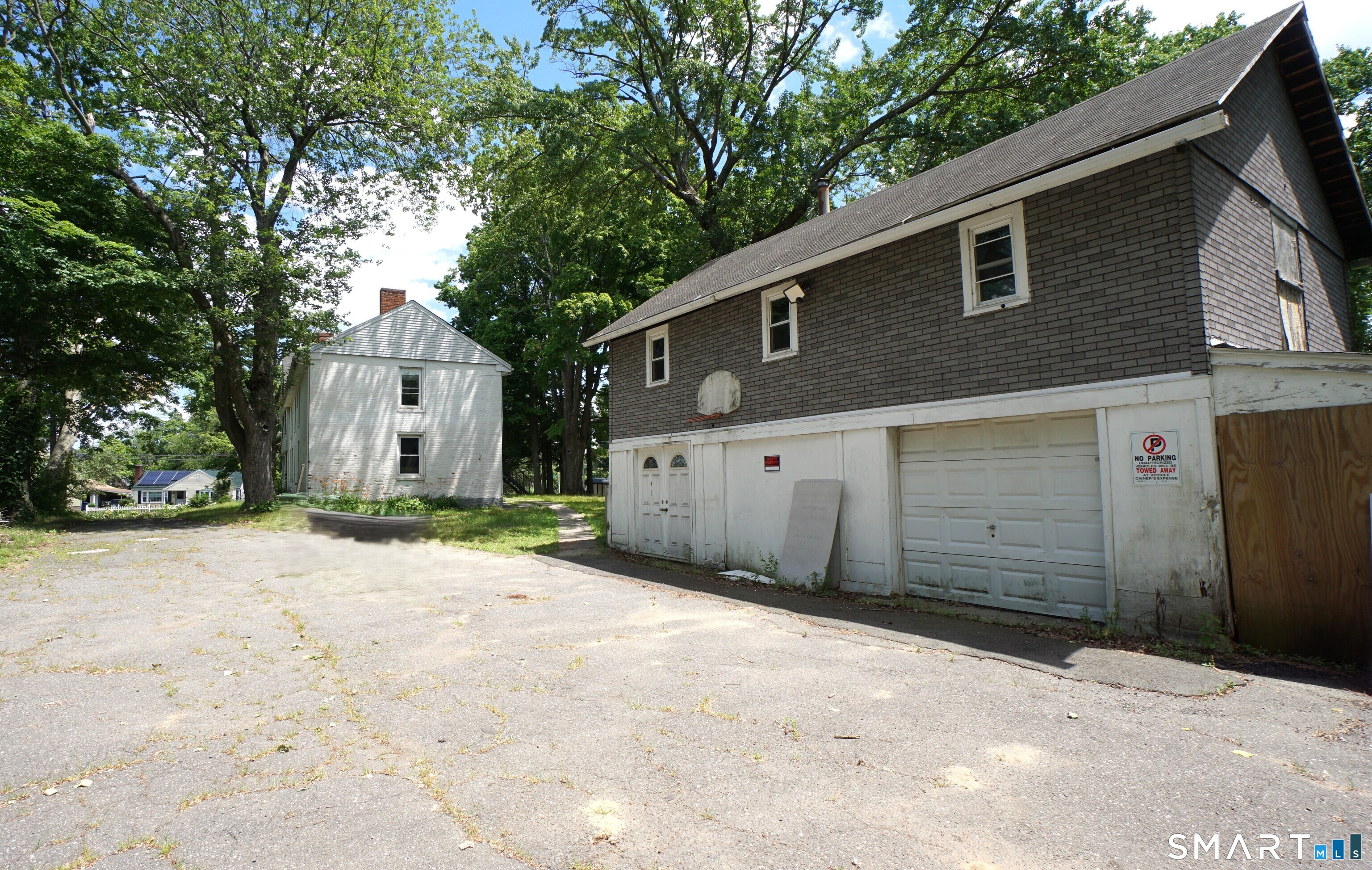 245 Deerfield Road Windsor, CT 06095 - Photo 8 of 27 Garage, Barn, shed & storage. There is Spiral Staircase leading to upstairs that can be used as additional rental income.