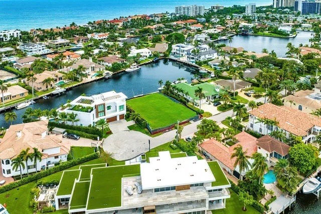 an aerial view of lake residential houses with outdoor space