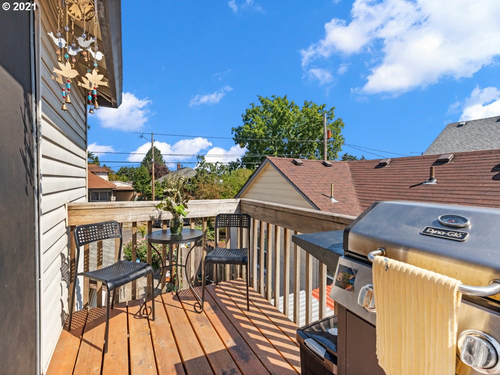 8106 Southeast Knight Street Portland, OR 97206 - Photo 12 of 29 a view of a chairs and table in the balcony