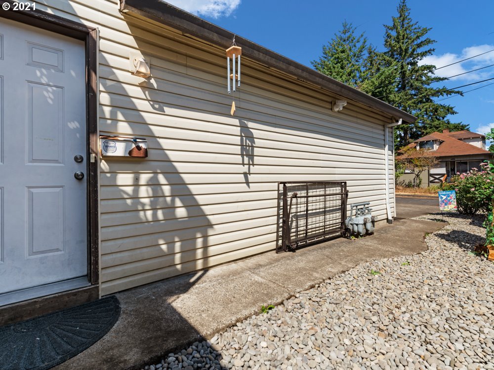 8106 Southeast Knight Street Portland, OR 97206 - Photo 13 of 29 a view of a house with a yard