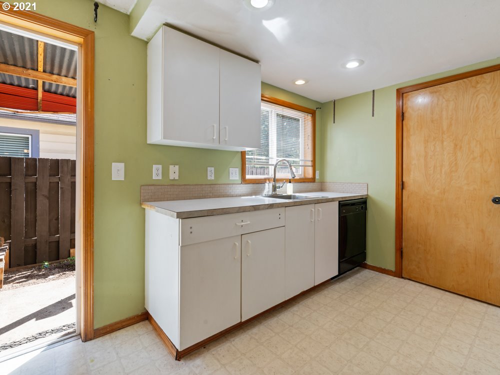 8106 Southeast Knight Street Portland, OR 97206 - Photo 19 of 29 a kitchen with a sink and cabinets