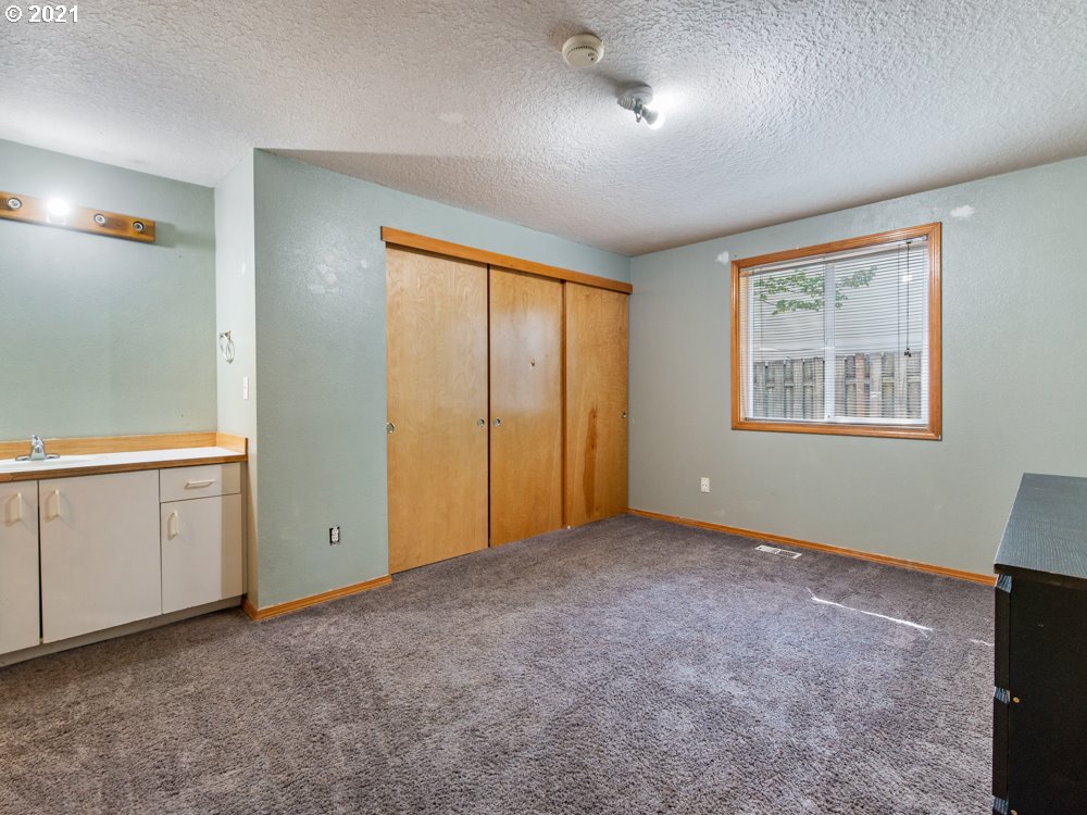 8106 Southeast Knight Street Portland, OR 97206 - Photo 22 of 29 a view of an empty room with window