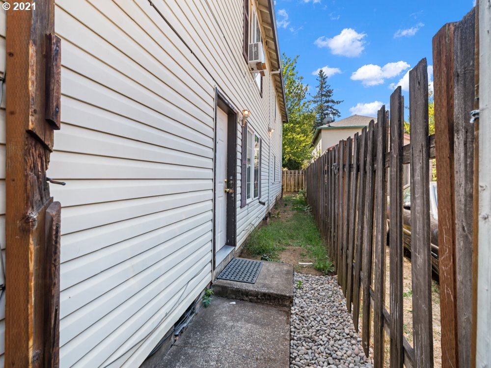 8106 Southeast Knight Street Portland, OR 97206 - Photo 27 of 29 a view of a pathway of a building