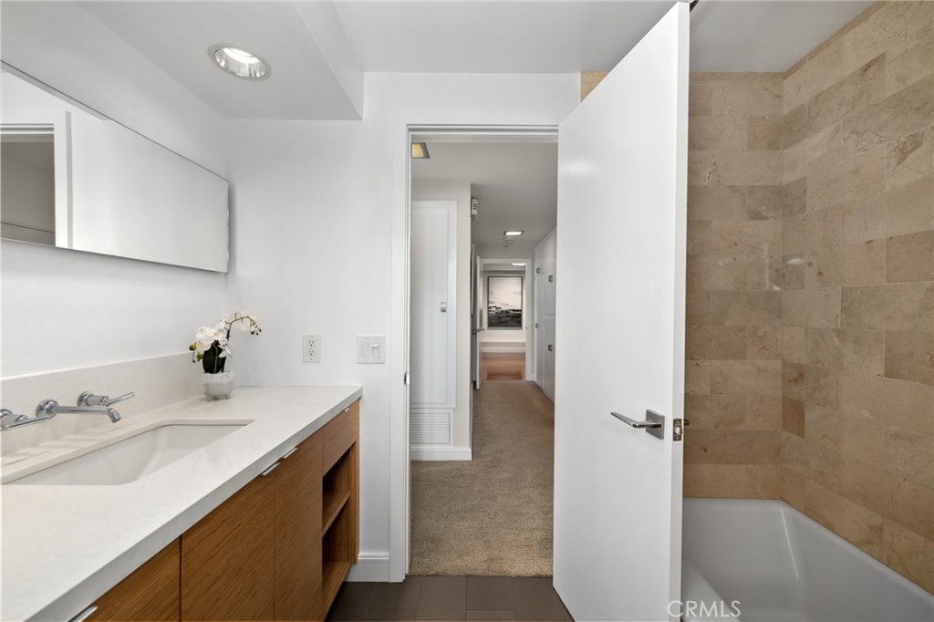 598 Camillo Road Sierra Madre, CA 91024 - Photo 42 of 75 a bathroom with a tub sink and mirror