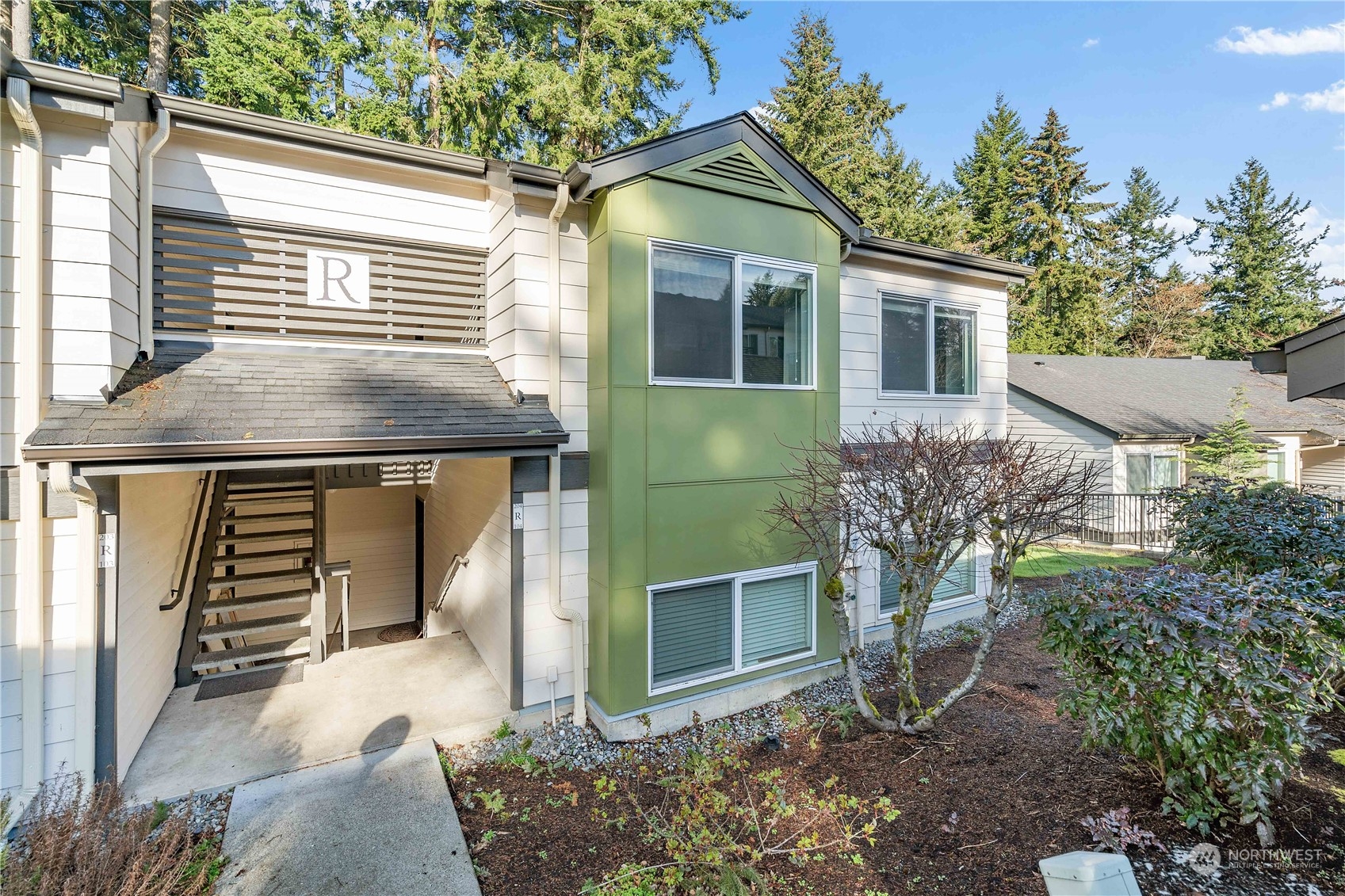 31500 33rd Place Southwest, Unit R204 Federal Way, WA 98023 - Photo 12 of 26 a front view of a house with a yard