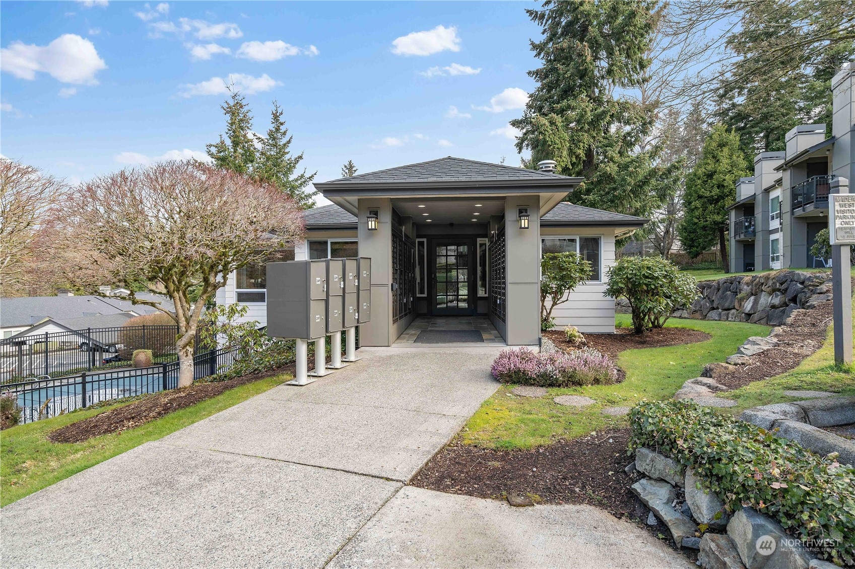 31500 33rd Place Southwest, Unit R204 Federal Way, WA 98023 - Photo 15 of 26 a front view of a house with garden