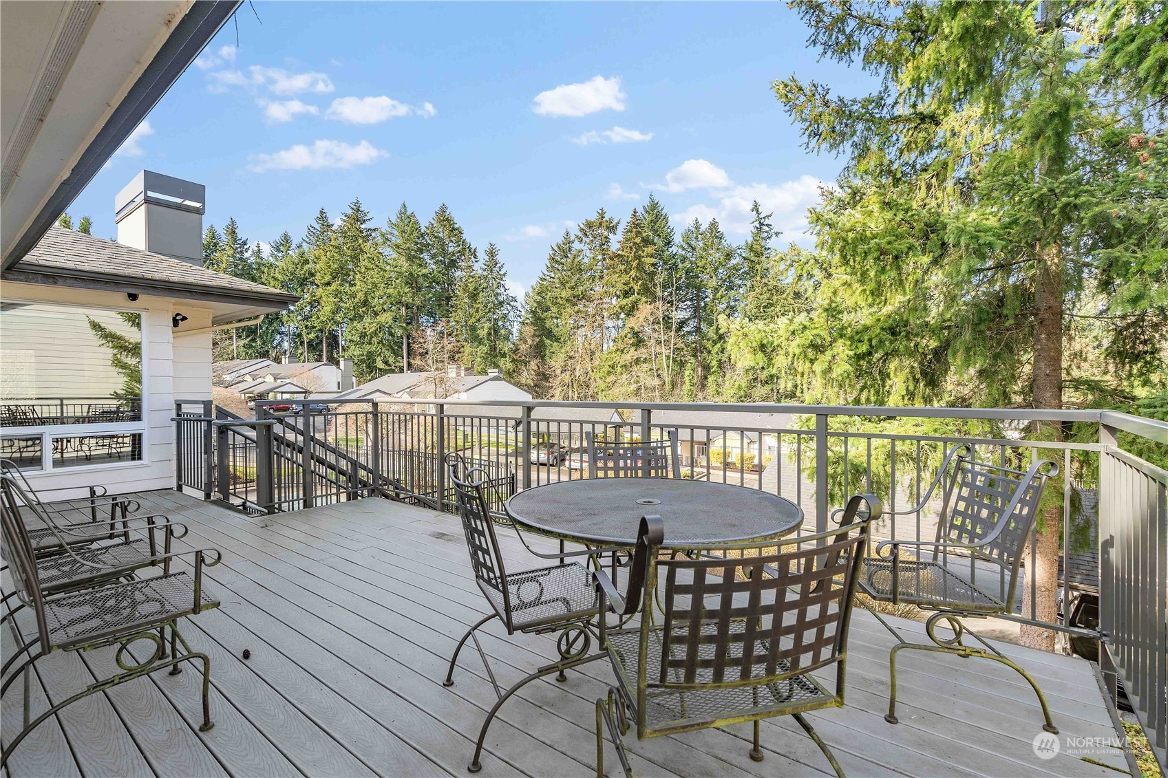 31500 33rd Place Southwest, Unit R204 Federal Way, WA 98023 - Photo 19 of 26 a view of a chairs and table on the wooden floor
