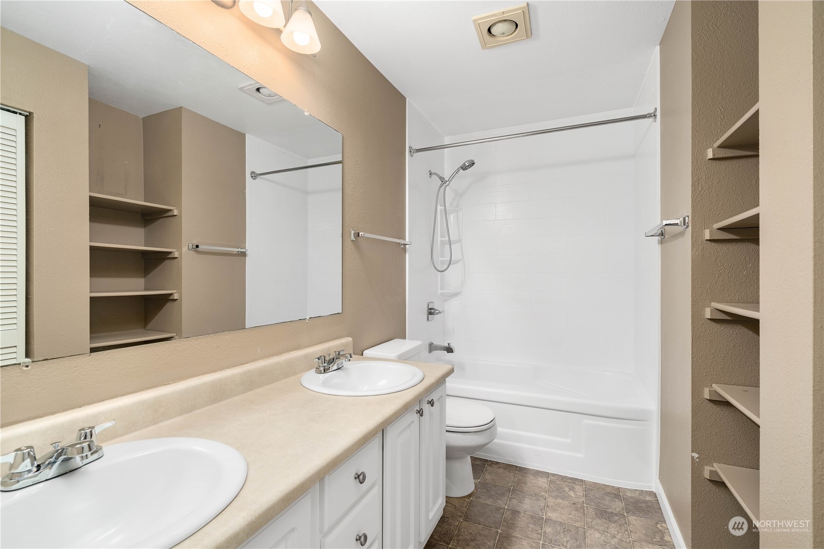 31500 33rd Place Southwest, Unit R204 Federal Way, WA 98023 - Photo 8 of 26 a bathroom with a granite countertop sink toilet and shower