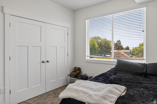 2811 South Orch Hl Lane Perry, UT 84302 - Photo 8 of 18 Bright white walls and trim complement the light-colored carpeting