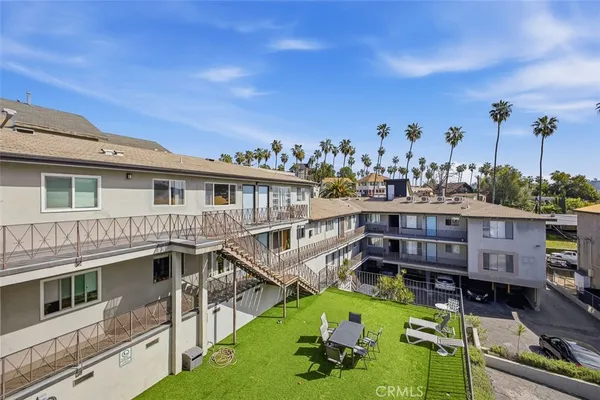 a view of a house with swimming pool