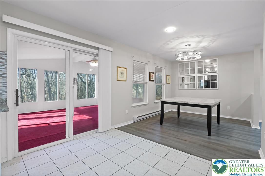 798 Sullivan Trail Scotrun, PA 18355 - Photo 13 of 46 a view of a livingroom with furniture window and wooden floor