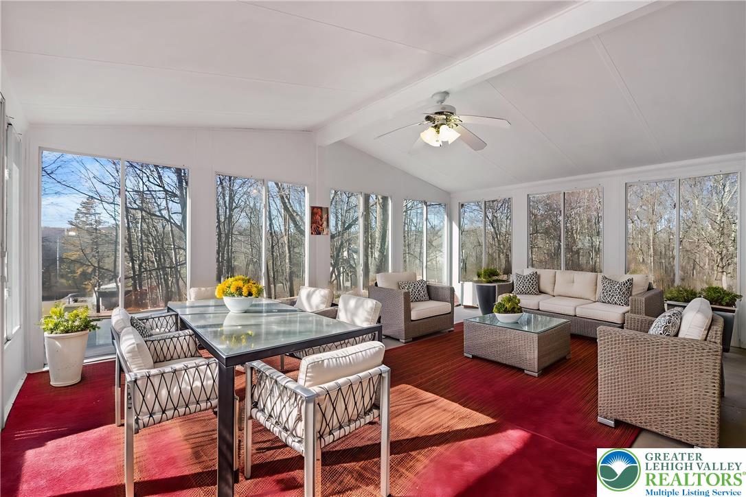 798 Sullivan Trail Scotrun, PA 18355 - Photo 14 of 46 a living room with furniture and a large window