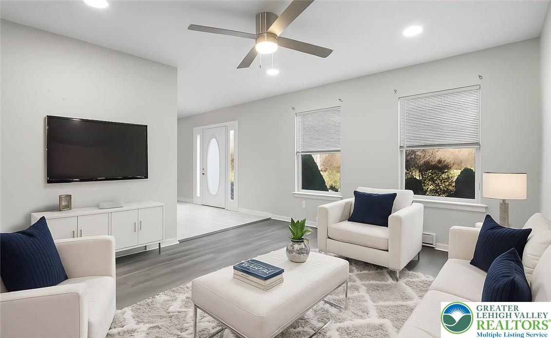 798 Sullivan Trail Scotrun, PA 18355 - Photo 21 of 46 a living room with furniture and a flat screen tv
