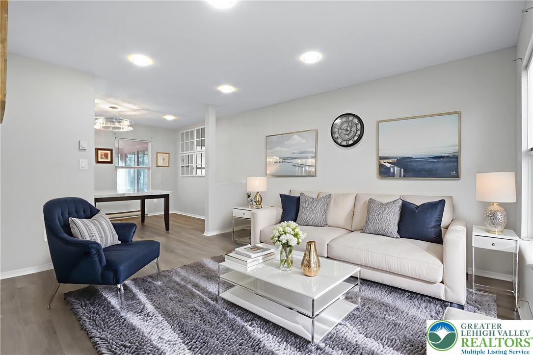 798 Sullivan Trail Scotrun, PA 18355 - Photo 8 of 46 a living room with furniture and a table