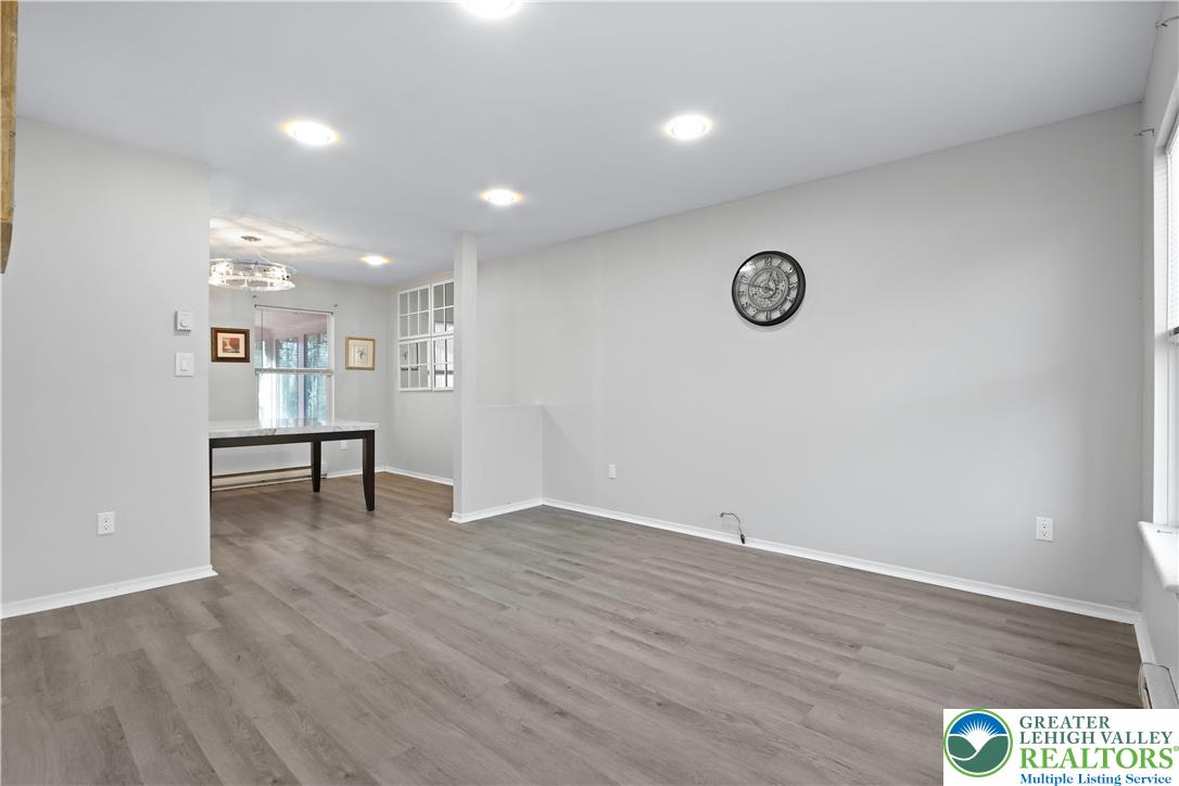 798 Sullivan Trail Scotrun, PA 18355 - Photo 9 of 46 a view of an empty room with wooden floor