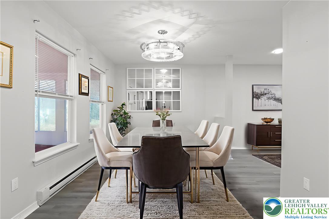 798 Sullivan Trail Scotrun, PA 18355 - Photo 10 of 46 a view of a dining room with furniture window and wooden floor