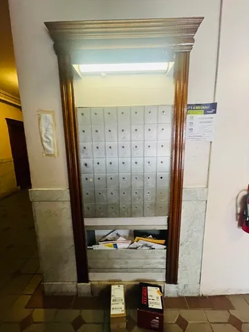 a view of a entryway door with furniture