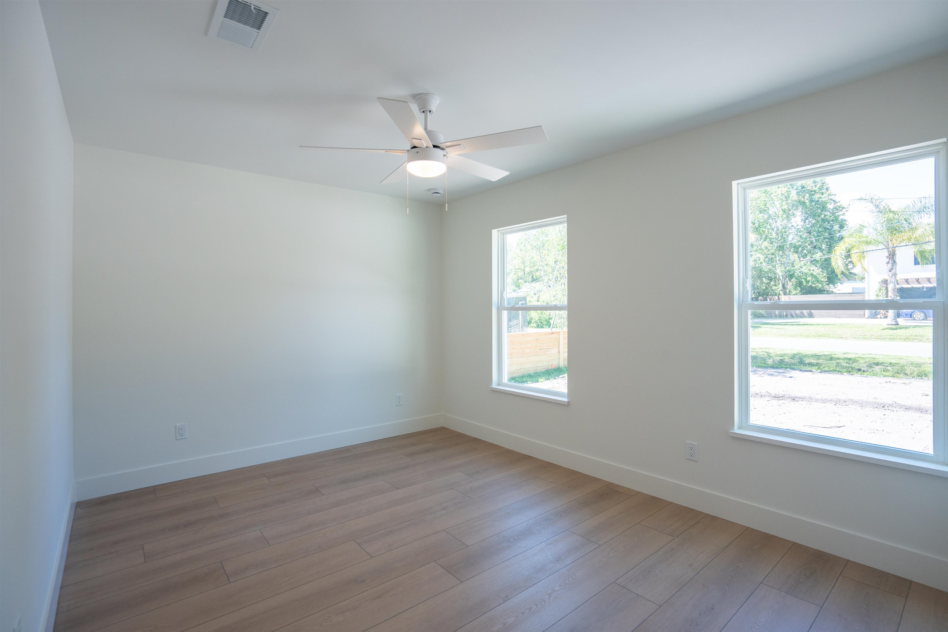 411 Royal Road St. Augustine, FL 32086 - Photo 13 of 43 a view of empty room with wooden floor and fan