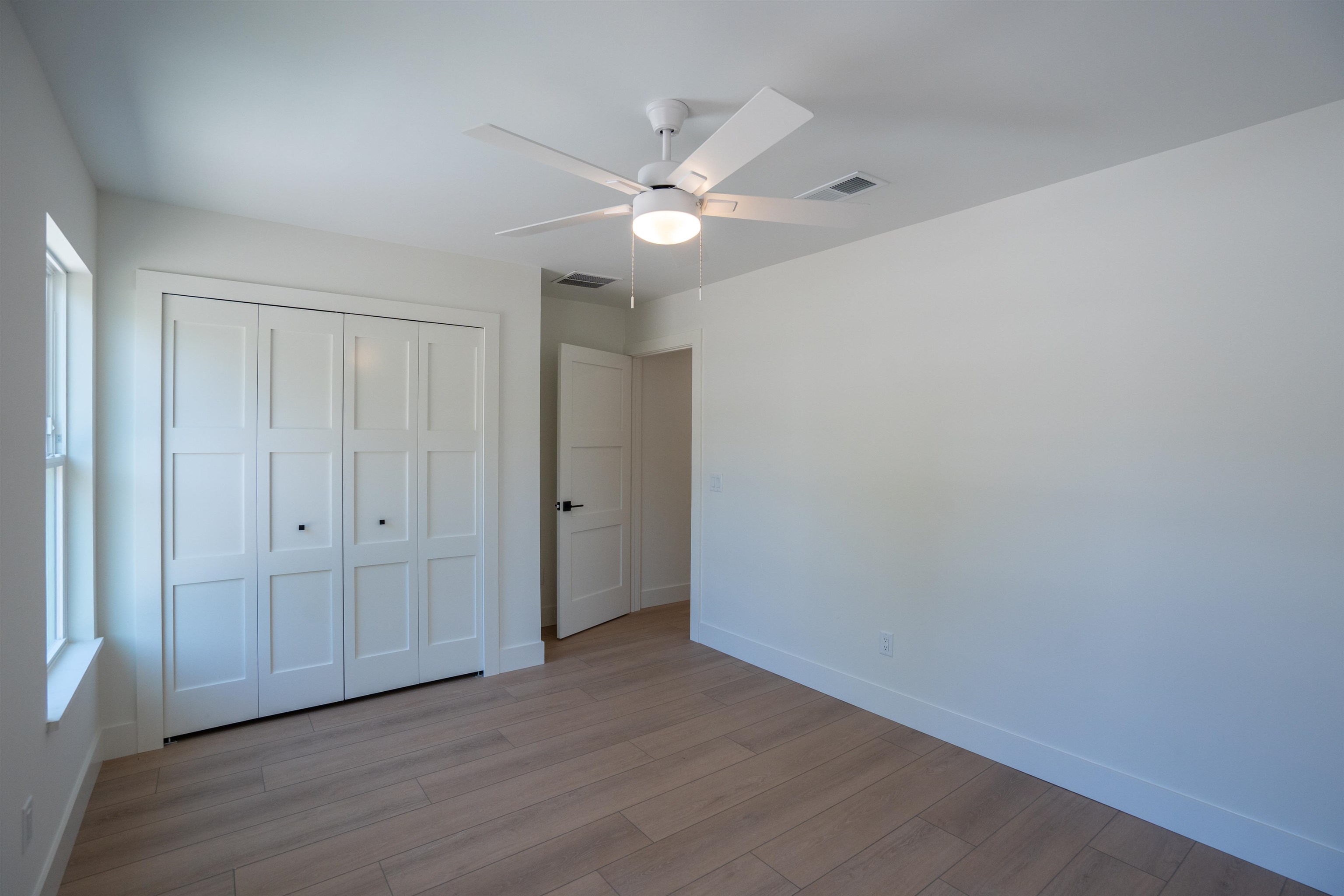 411 Royal Road St. Augustine, FL 32086 - Photo 14 of 43 a view of empty room with wooden floor